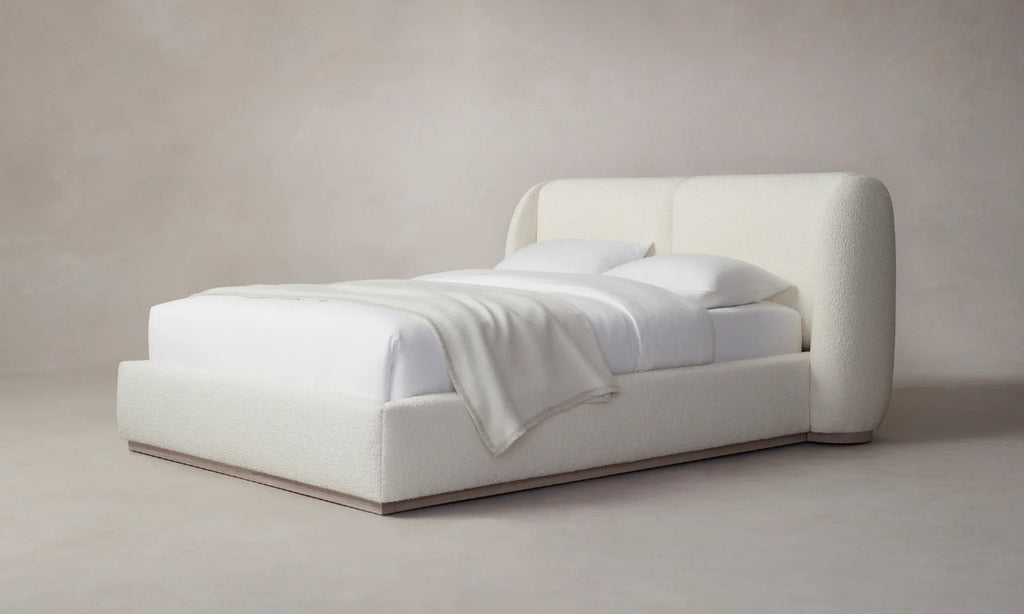 Angled view Snug Fabric Upholstered Bed with a cozy design, perfect for adding comfort to your bedroom space