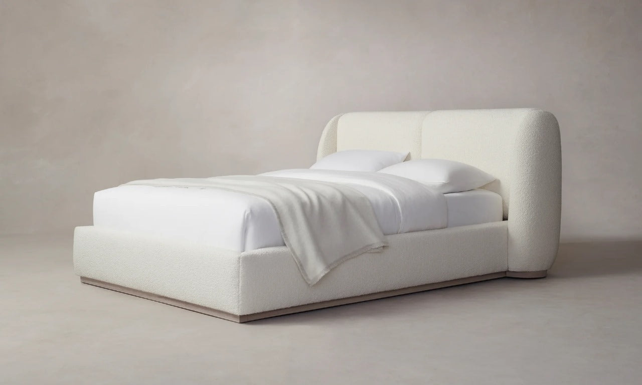Angled view Snug Fabric Upholstered Bed with a cozy design, perfect for adding comfort to your bedroom space