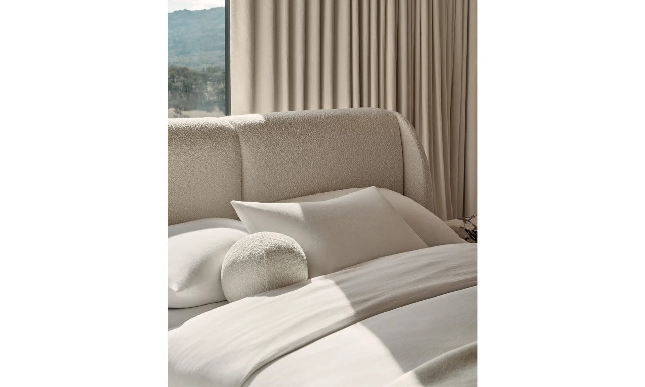 Stylish view Snug Fabric Upholstered Bed with a cozy design, perfect for adding comfort to your bedroom space